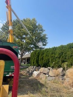 Service Truck Parked Beside A Tree - Benton City, WA - Aria Tree Service