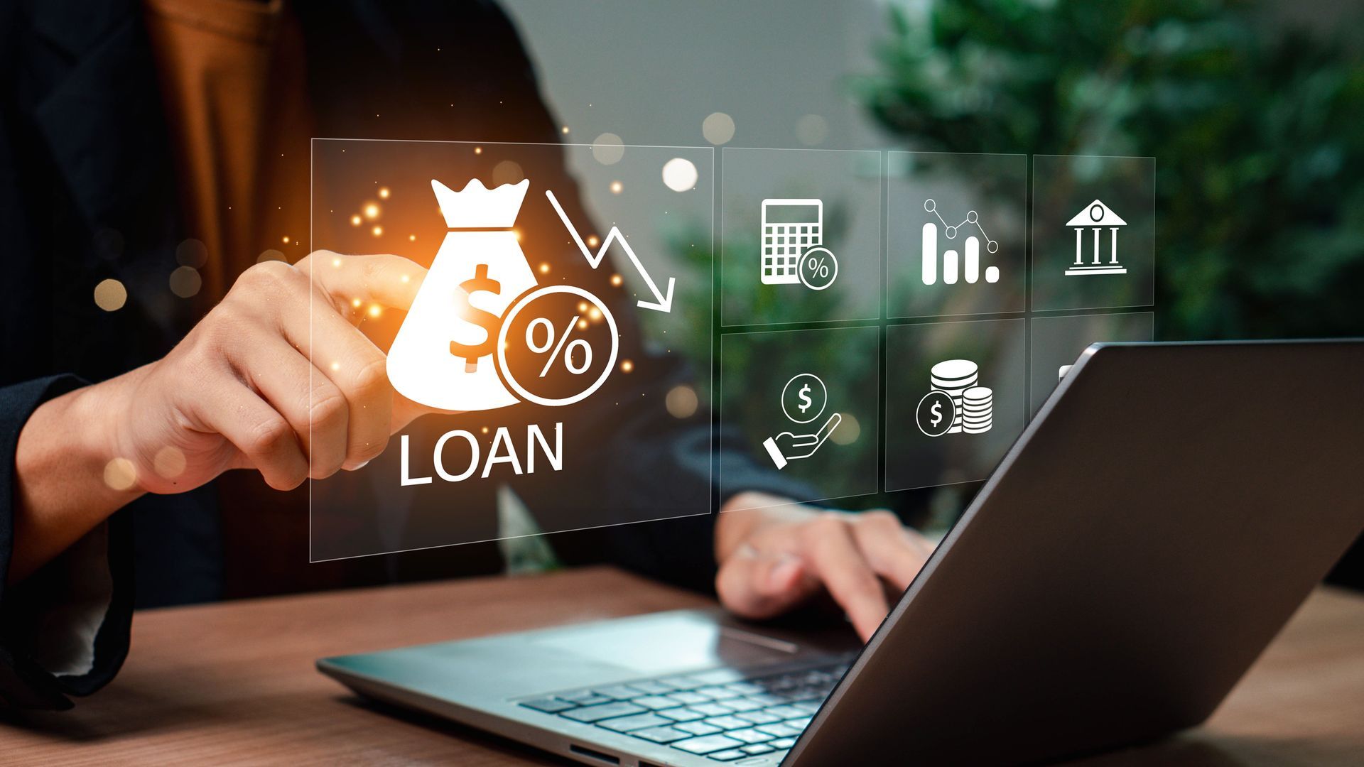 Person using laptop, interacting with loan application interface, featuring money bag icon and financial symbols.