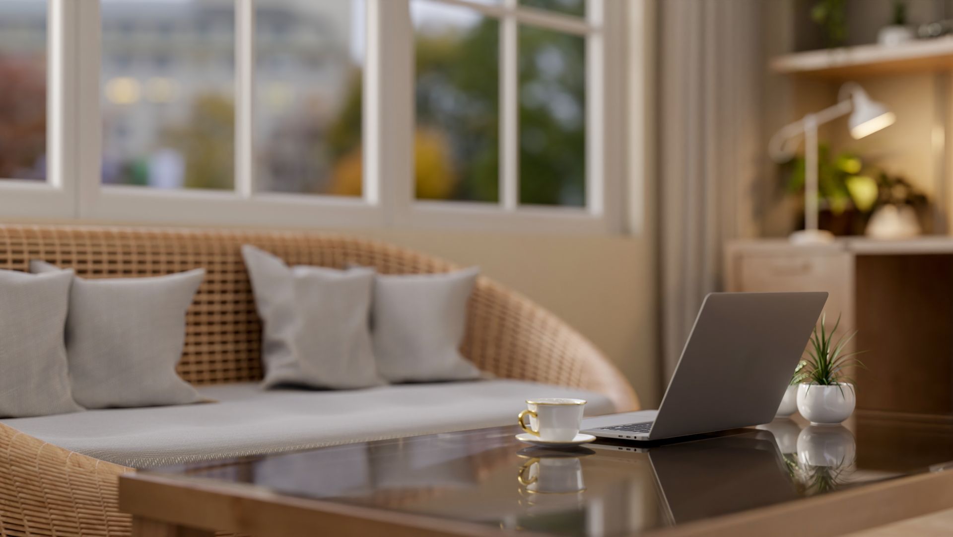 A modern home interior with a large window behind the sofa
