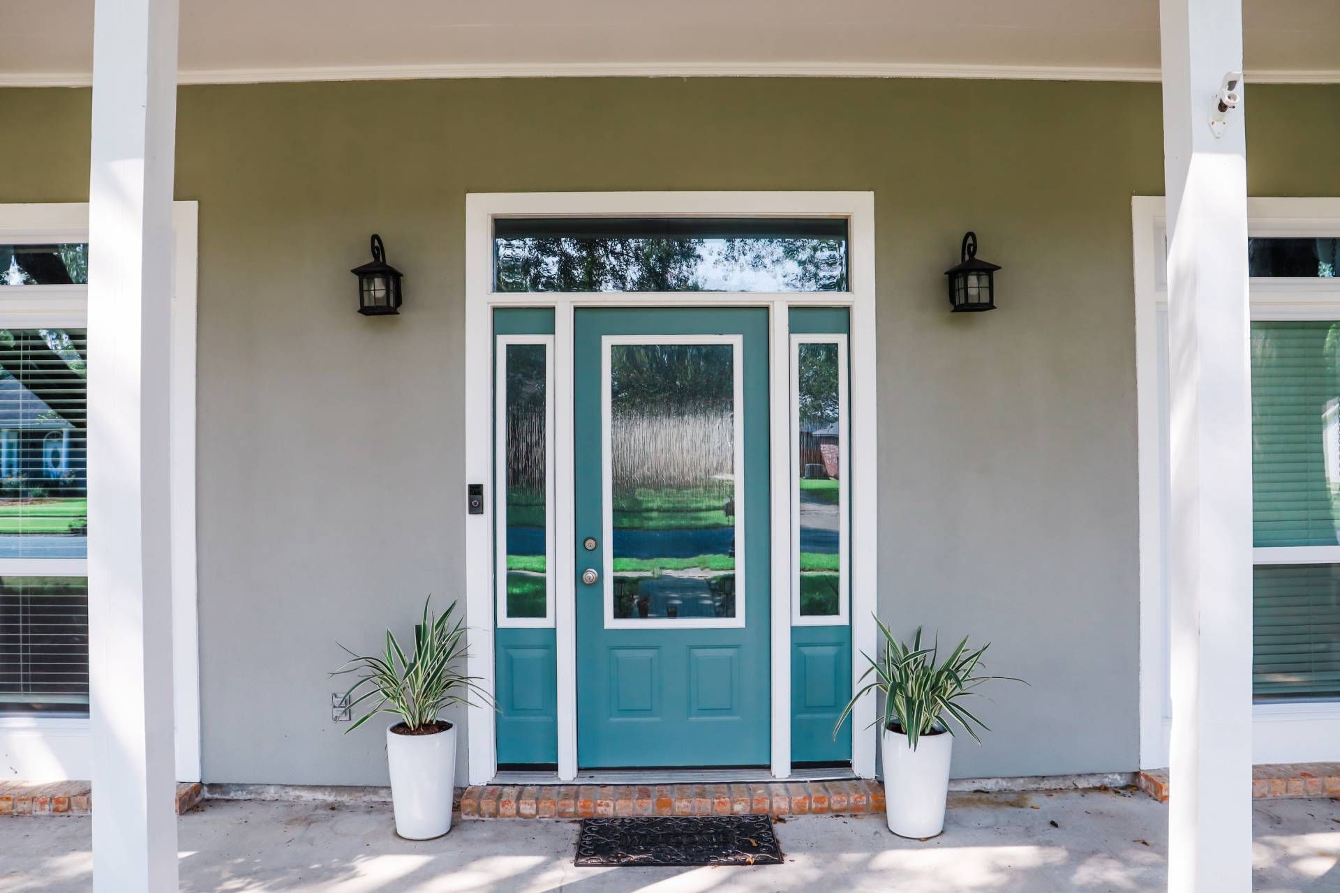 A home with two sidelights at Captivating Windows by Magnolias near Norfolk, Nebraska