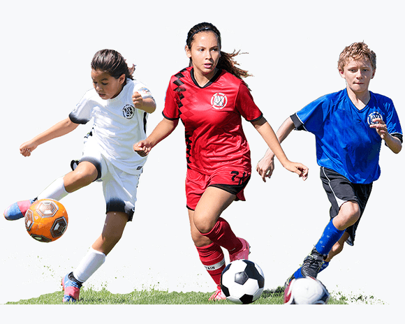 Three soccer players in red, white, and blue uniforms playing a match on a grass field.
