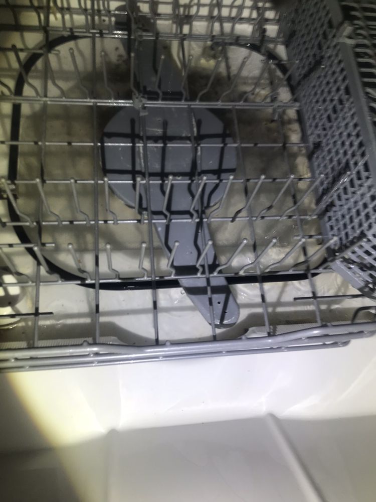 a close up of a dishwasher that is needed for arepair