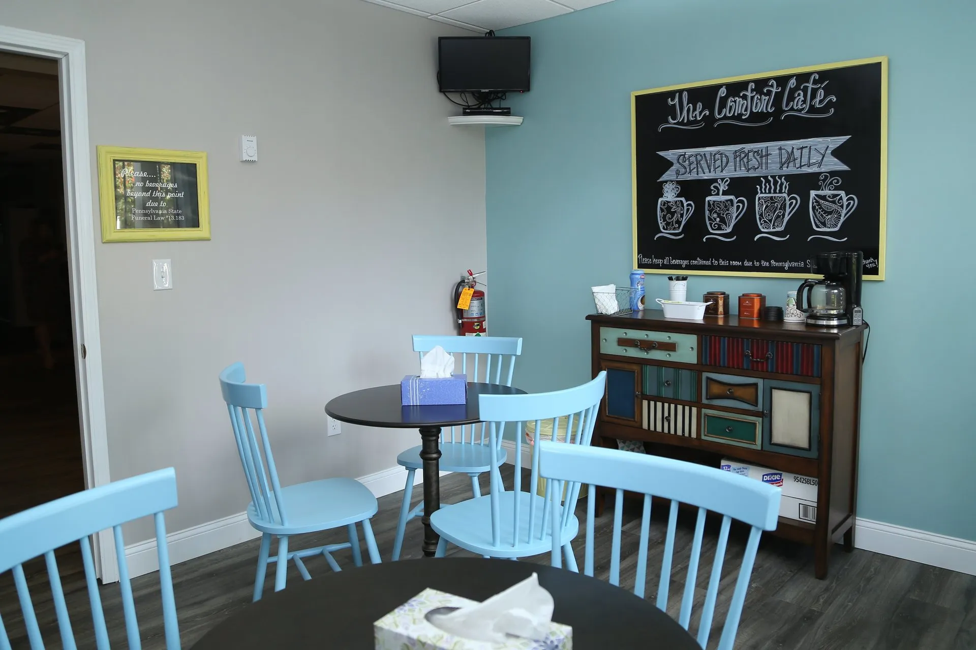 funeral home facilities cafe with pastel colored chairs