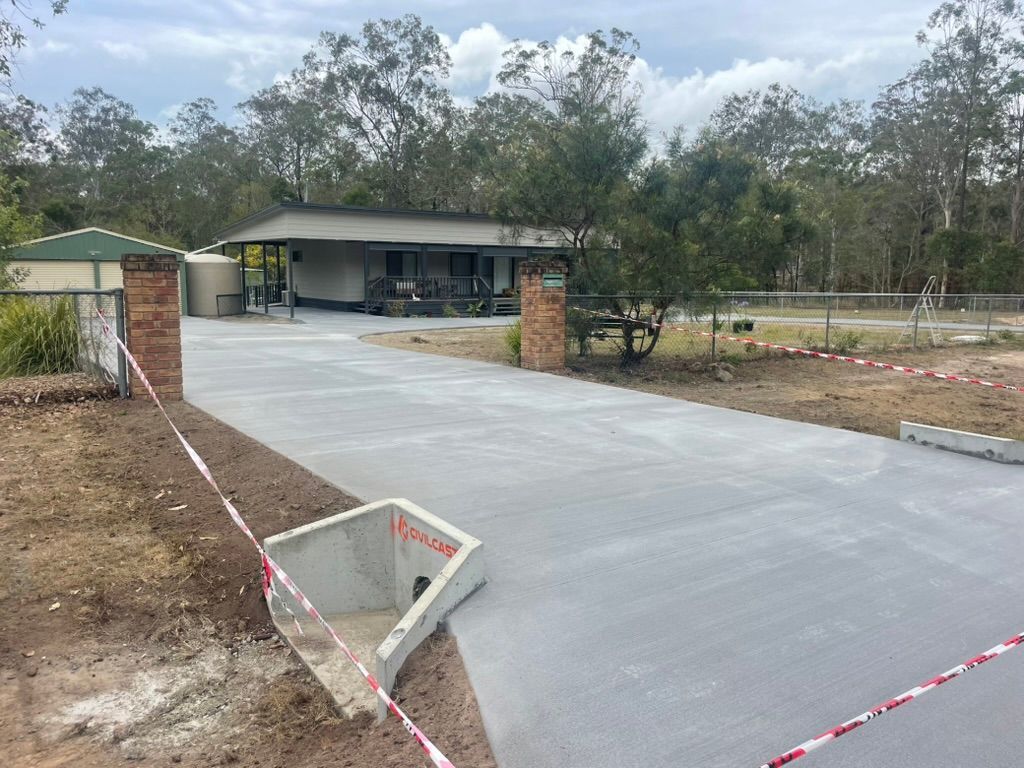 A Bulldozer is Drilling a Hole in the Ground — Tomac Civil In Burleigh Heads, QLD