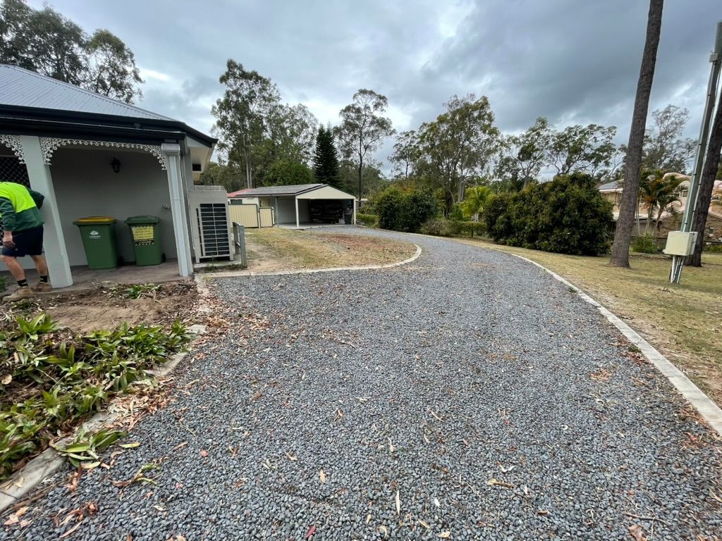 Gravel Driveway Leading to a House With a Carport — Asphalt & Concreting Services & Solutions in Logan Village, QLD
