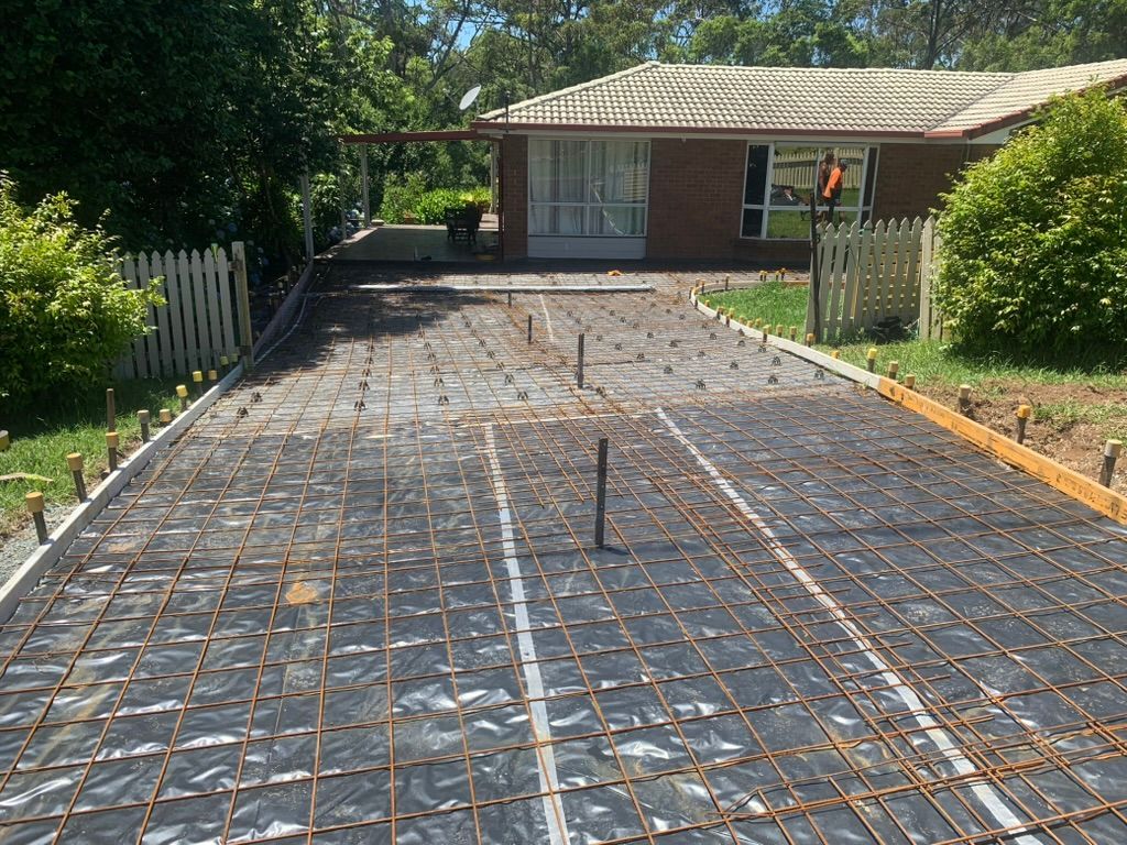 Driveway Under Construction With Rebar and Forms — Asphalt & Concreting Services & Solutions in Logan Village, QLD
