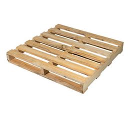 A wooden pallet is sitting on a white surface.