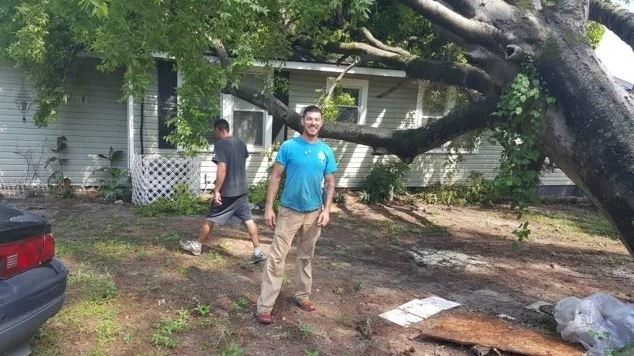 Worker Smile While Working For Tree Removal — Columbia, SC — Affordable Carolina Tree Service