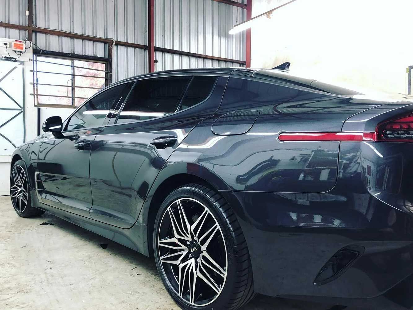 A Black Car is Parked in a Garage — Endrust (Coffs Harbour) in Coffs Harbour, NSW