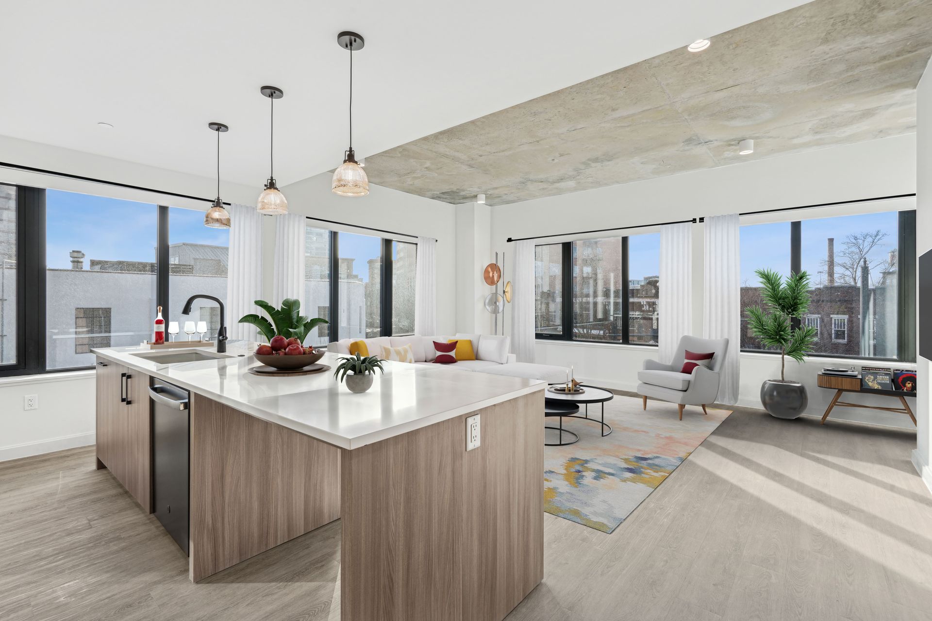 A kitchen with a large island in the middle of the room.