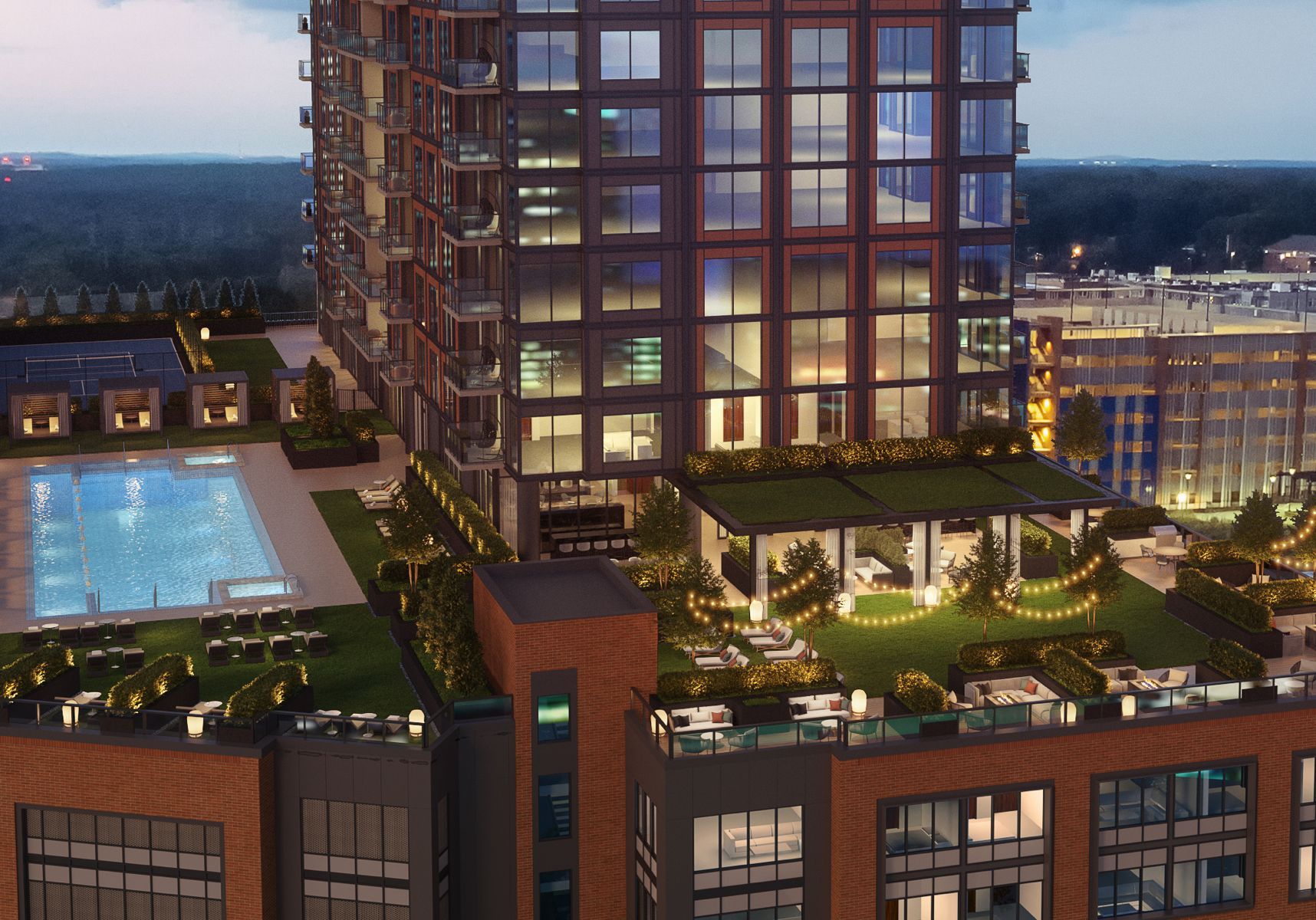 An aerial view of a building with a pool on the roof