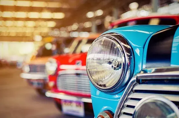 A Row of Old Cars Are Parked in A Garage β Wyong Radiator Repairs in Tuggerah, NSW