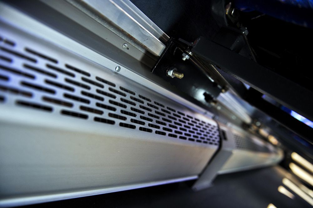 A Close up Of a Metal Grille on The Side of A Vehicle — Wyong Radiator Repairs in Gosford, NSW