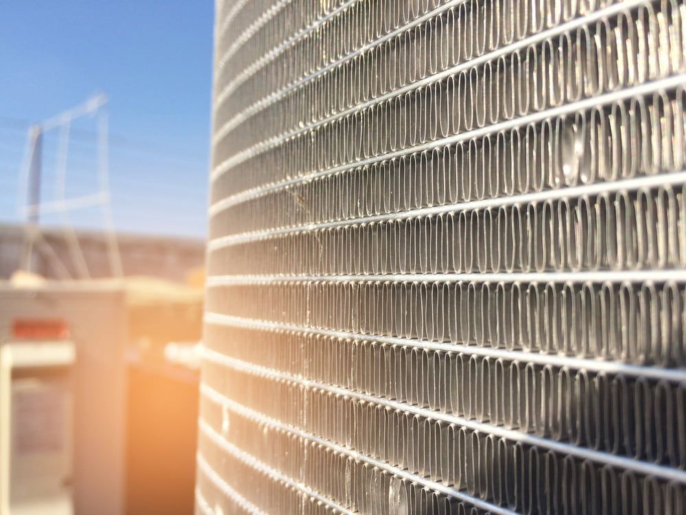 A Close up Of a Radiator on A Building with A Blue Sky in The Background β Wyong Radiator Repairs in Tuggerah, NSW