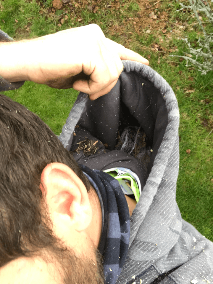 A man wearing a hoodie with the word united on it