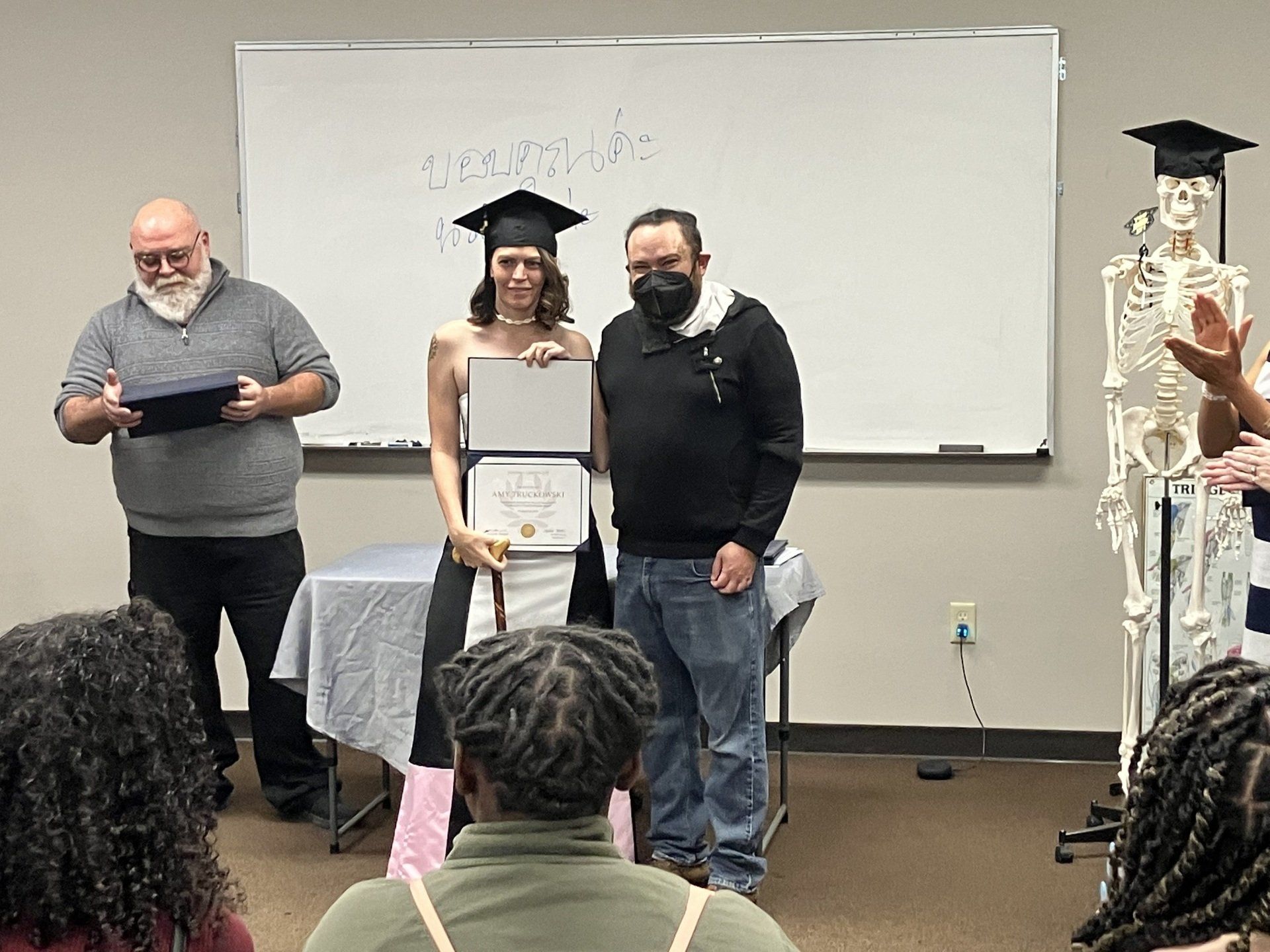 Amy is getting her certificate for massage therapy.