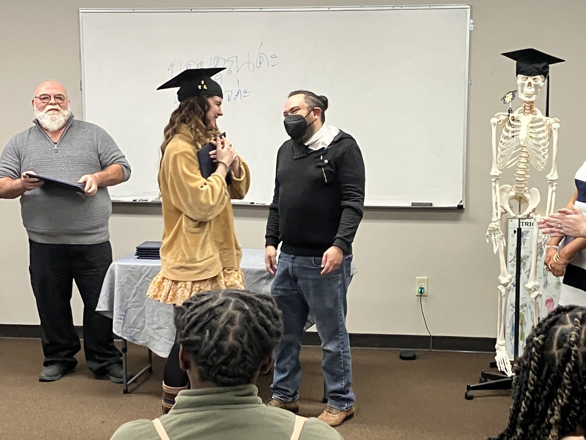 Charlie is getting her certificate for massage therapy.