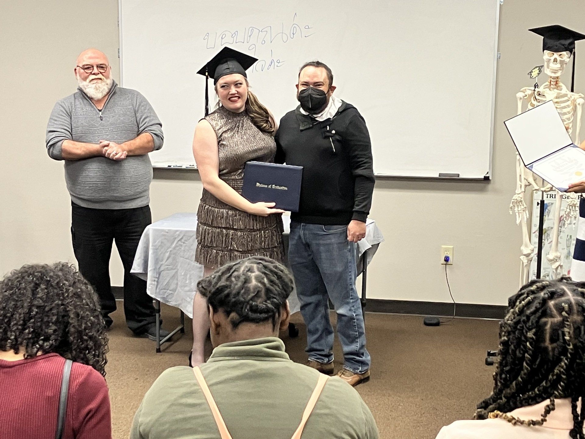 Elizabeth is getting her certificate for massage therapy.