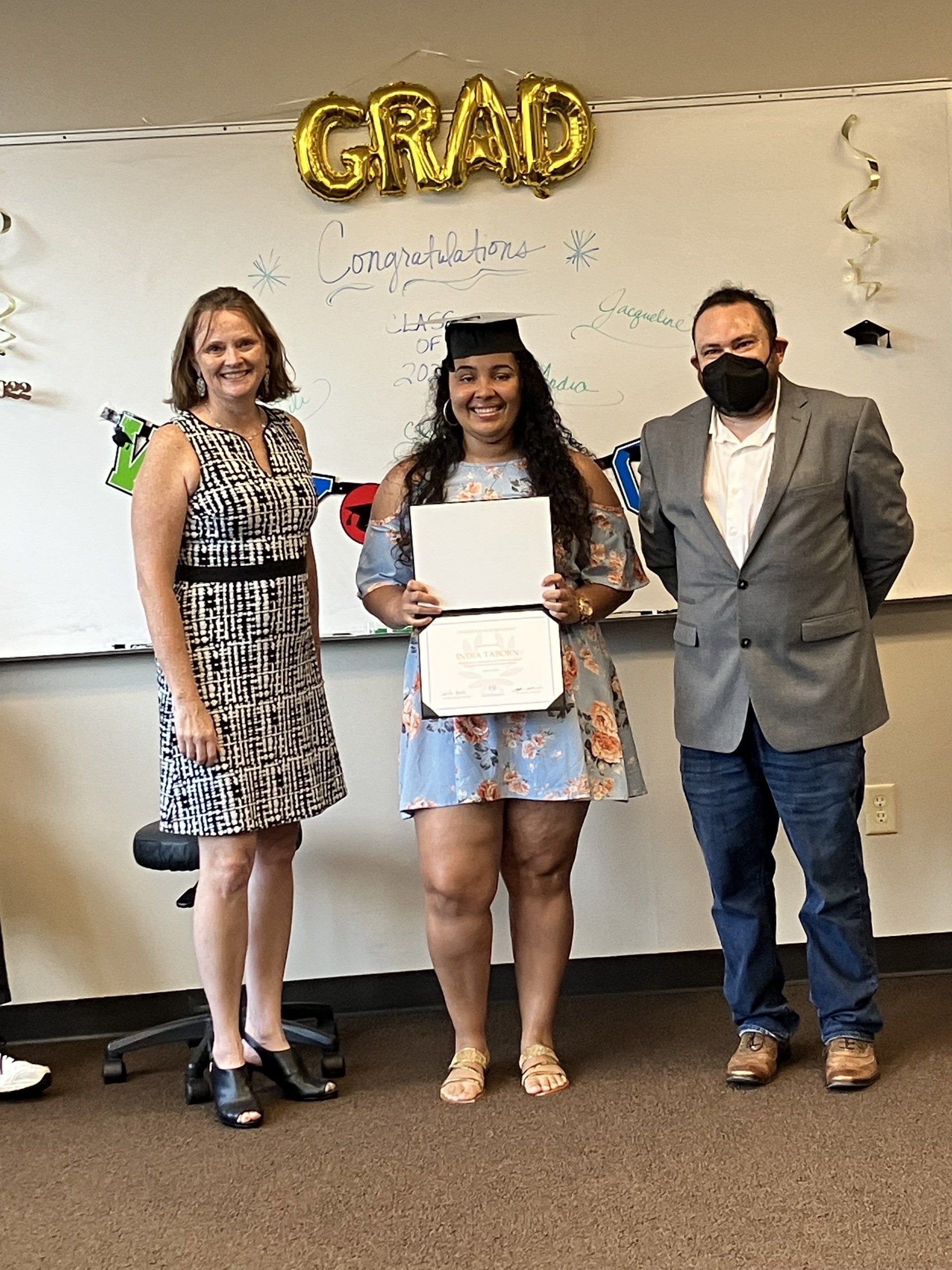 India is getting her certificate for massage therapy.