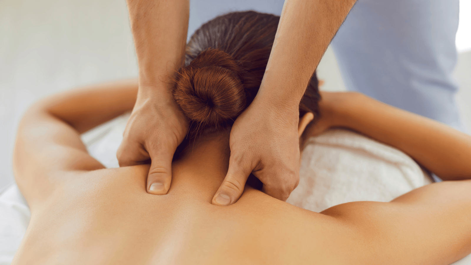 Certified Massage Therapist Giving Massage