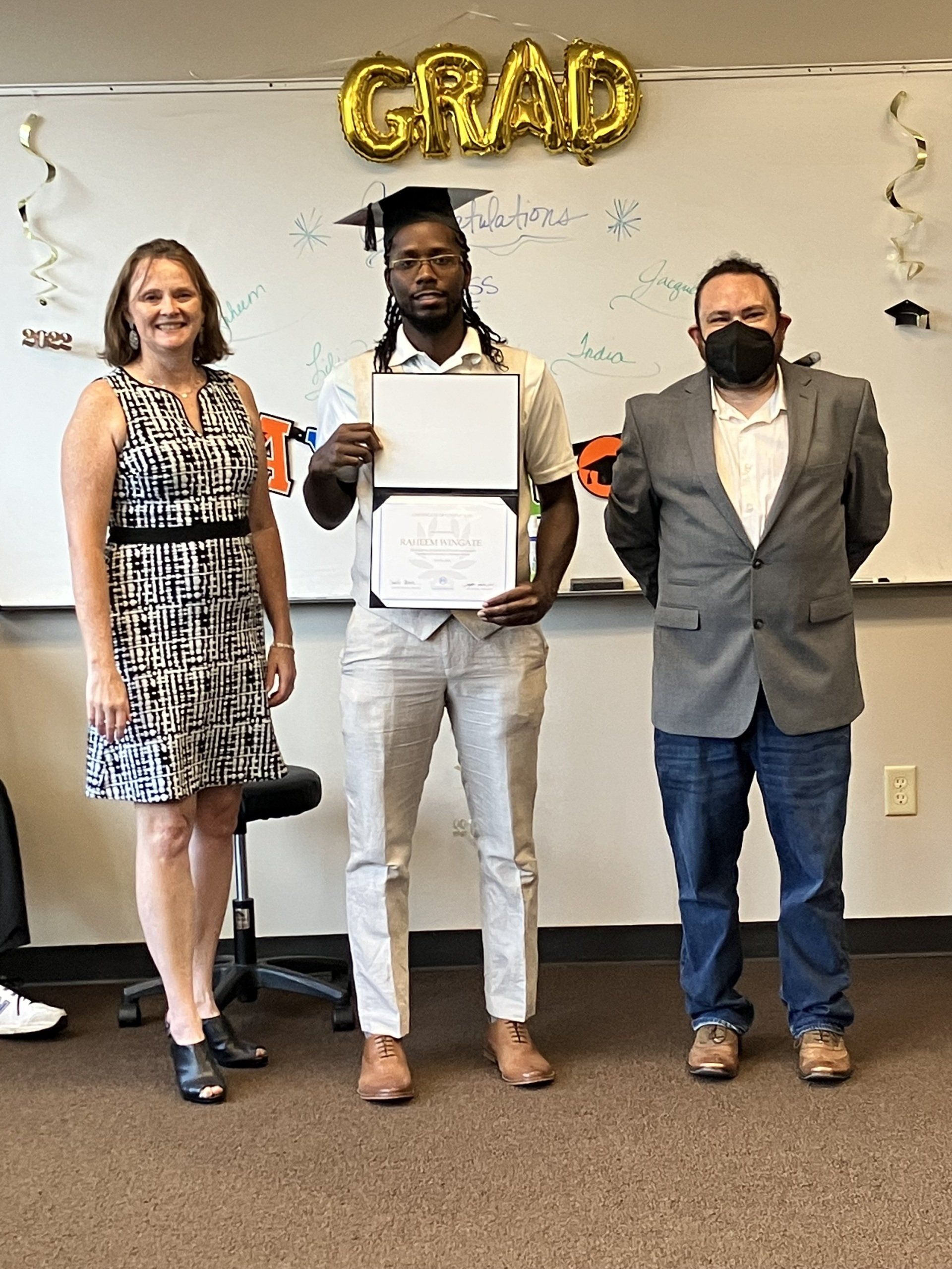 Raheem is getting her certificate for massage therapy.