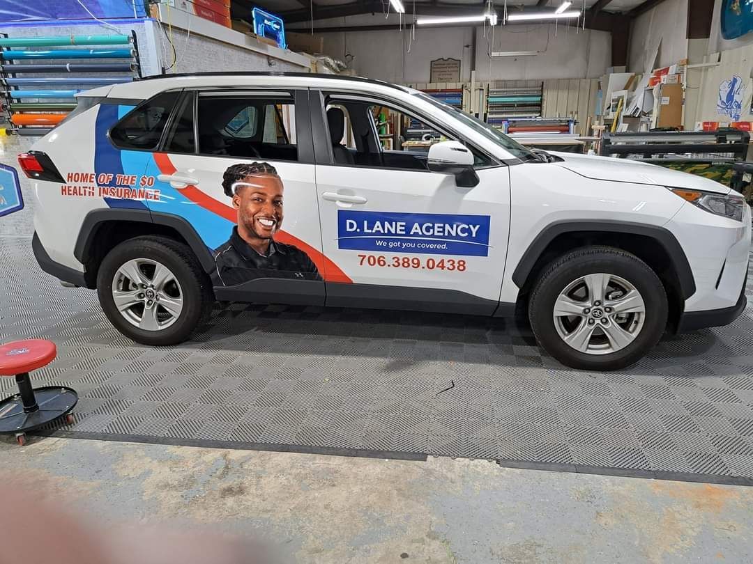 partial custom printed wrap with red and blue logos