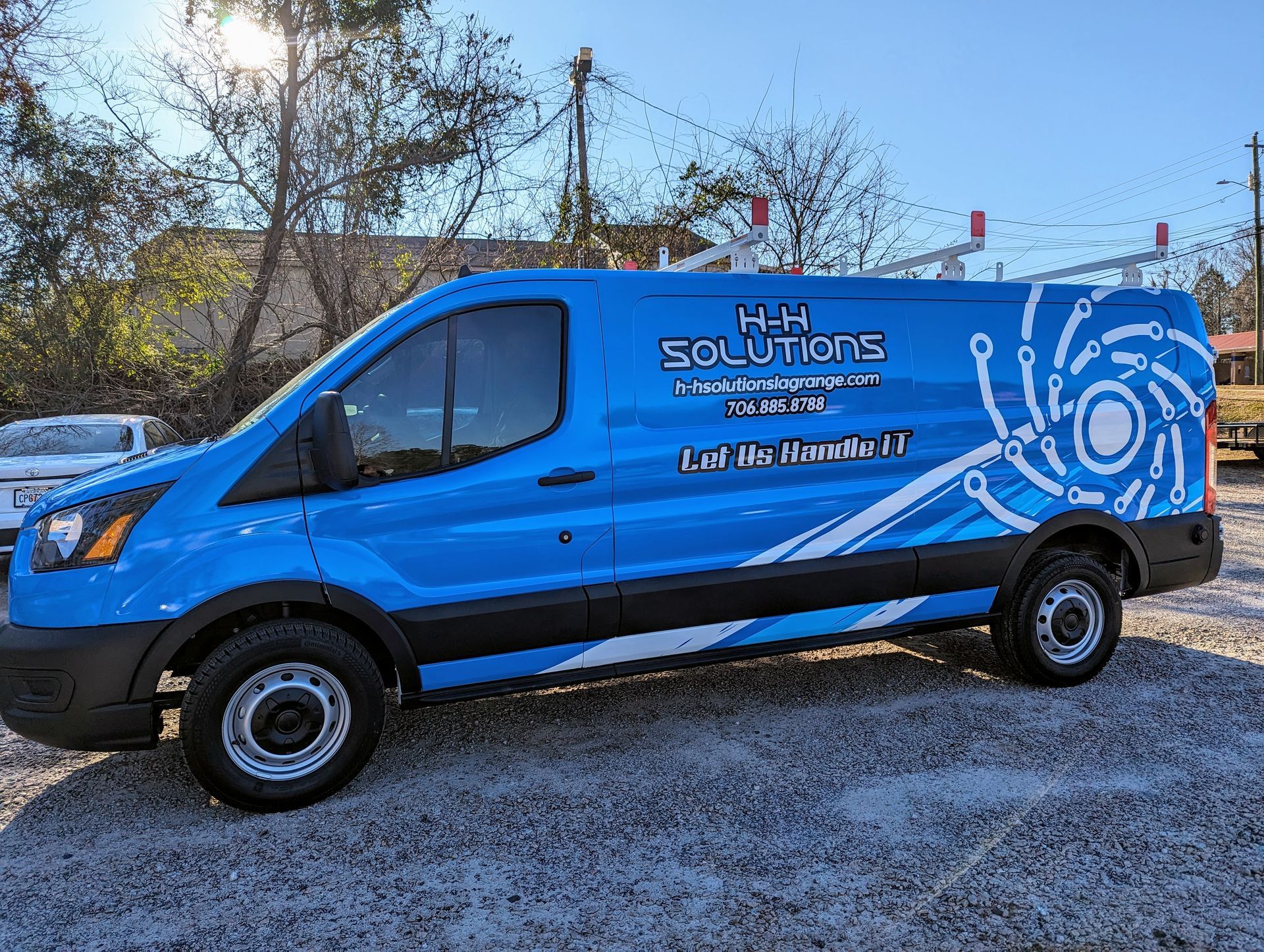 full custom printed commercial wrap in blue with white and black logos