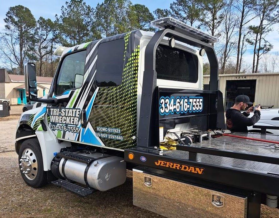 full custom printed commercial wrap on cab with white, blue, green  and black graphics