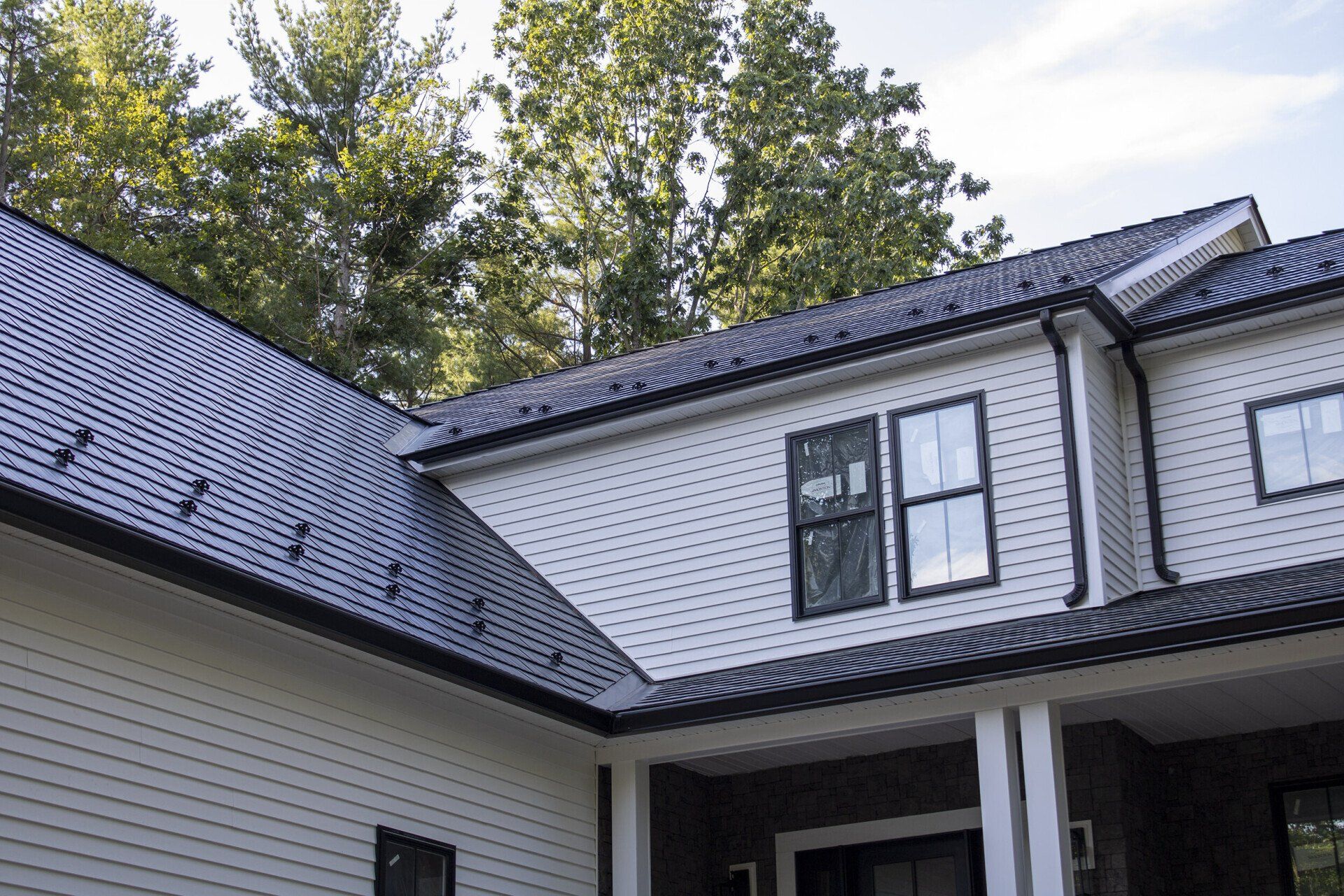 Foxborough, MA — Black Interlock® Metal Cedar Shingle Roofing System