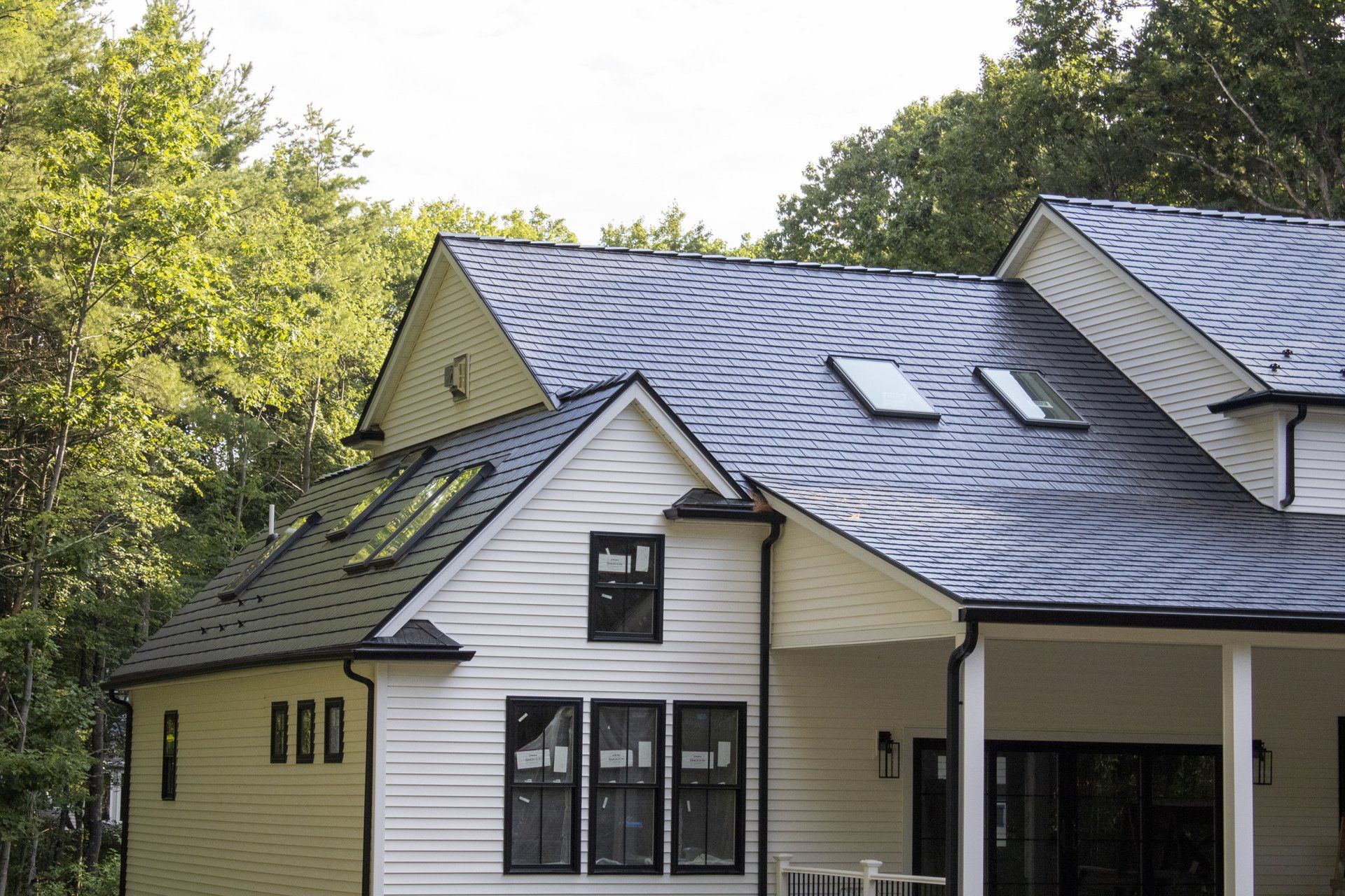 Foxborough, MA — Black Interlock® Metal Cedar Shingle Roofing System