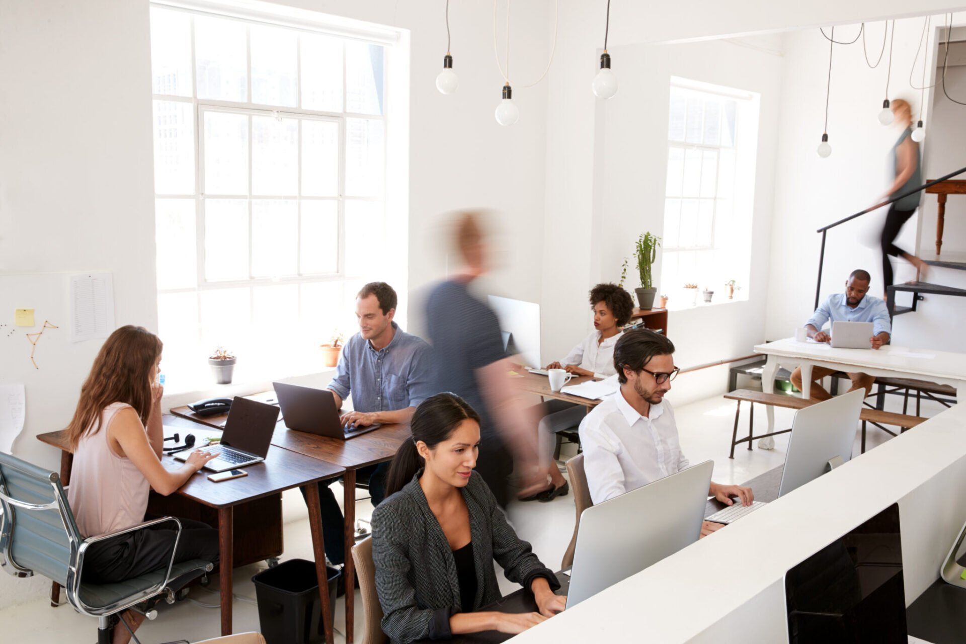 People in office sitting at desks