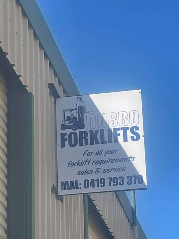 Sign for Dubbo Forklifts with logo and phone number, attached to a building.