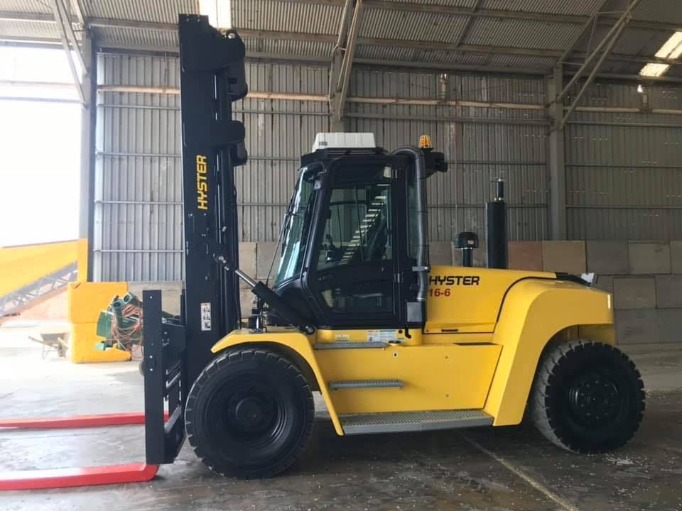 Yellow Hyster forklift in a warehouse.