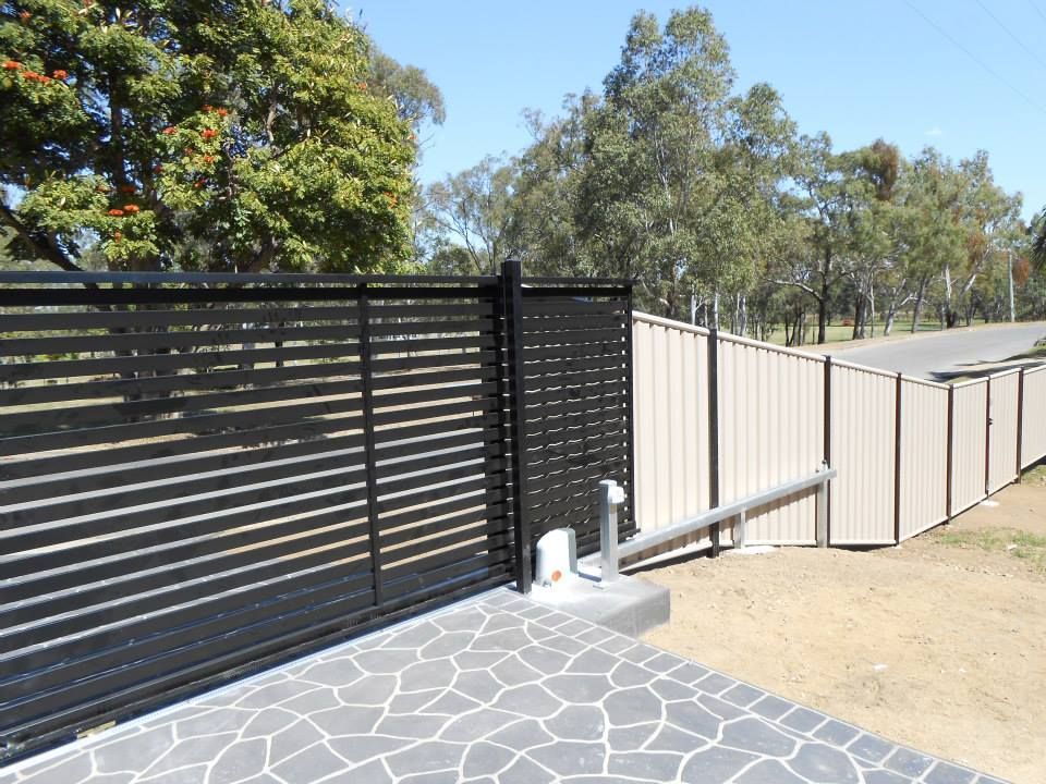 Black And White Metal Sheet Fence - Fencing in Rockhampton, QLD