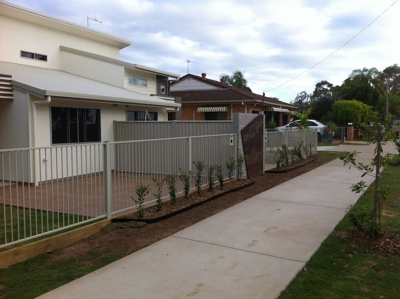 Wooden Retaining Wall And Fence - Fencing in Rockhampton, QLD