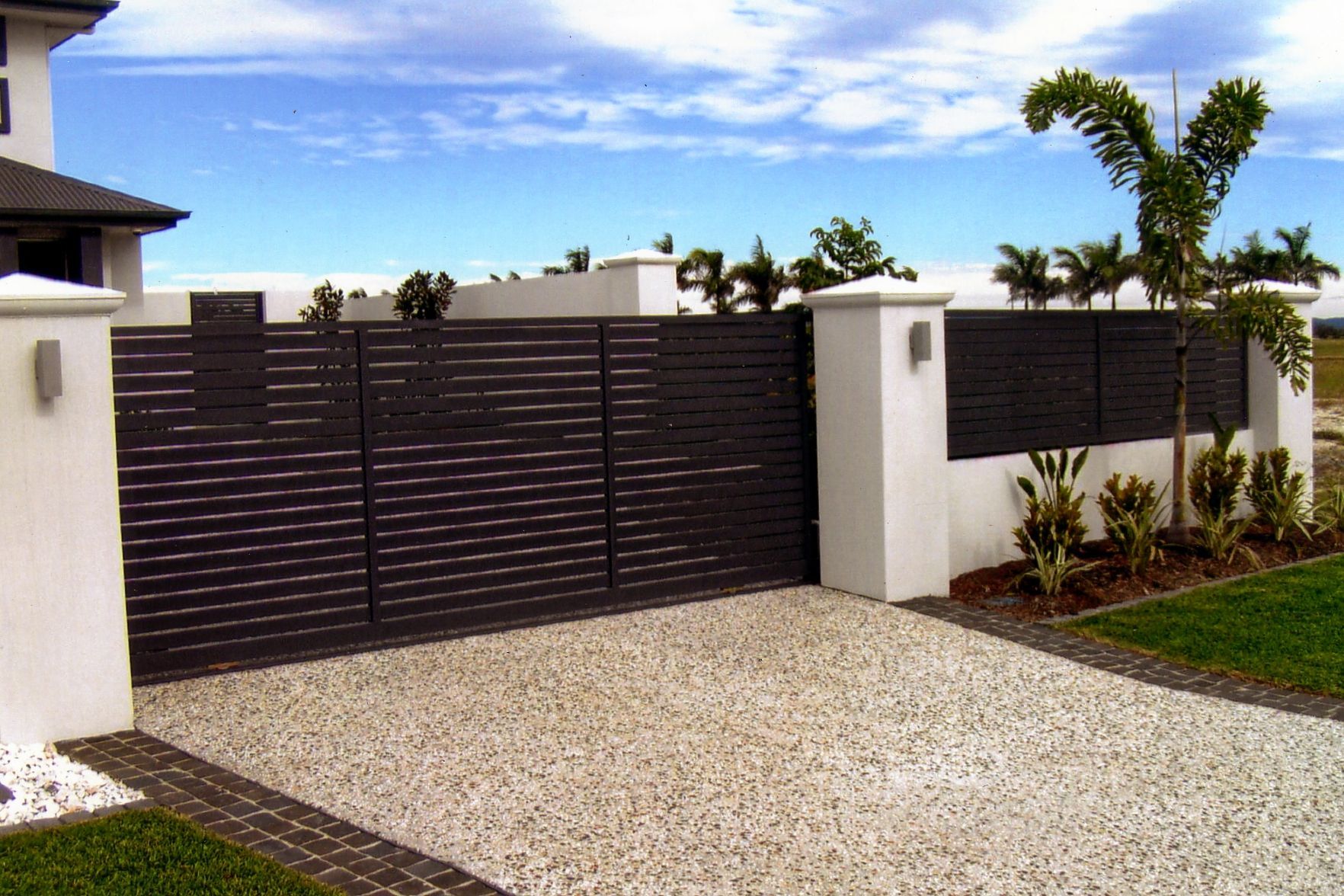 White Aluminium Fence In Front Yard - Fencing in Rockhampton, QLD