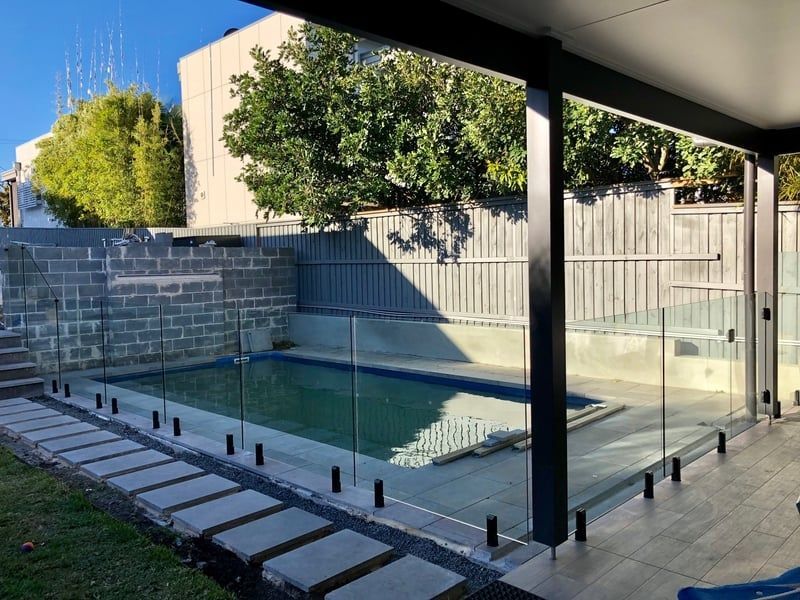 Backyard Patio With Glass Fence - Fencing in Rockhampton, QLD