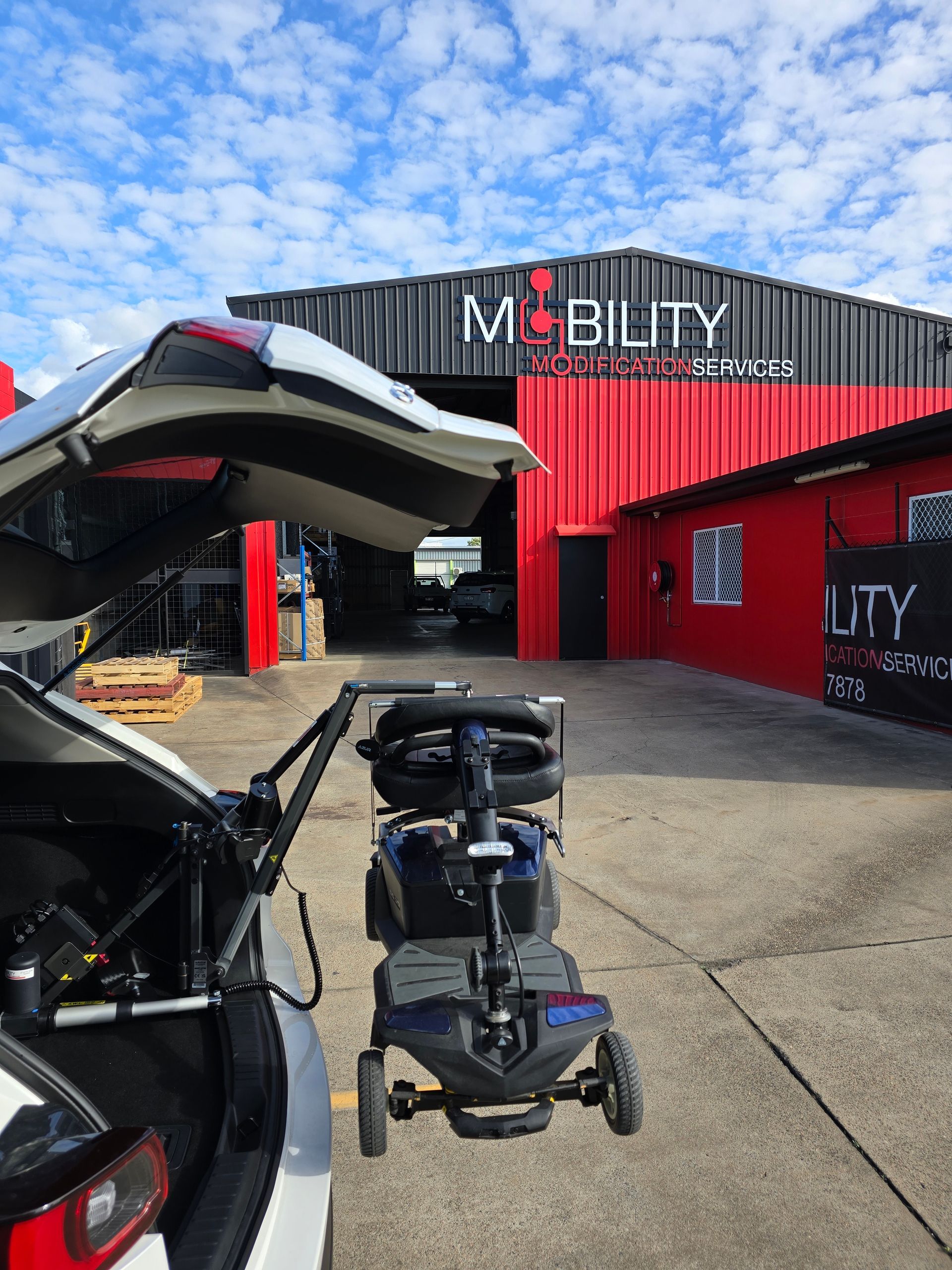 A Turny Seat At The Back Of A Car  — Mobility Modification Services In Garbutt, QLD