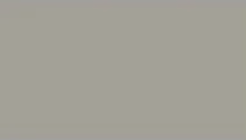 A close up of a plain gray background.