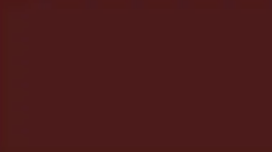 A close up of a dark red background.