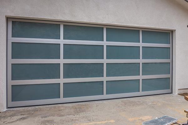 A garage door with a lot of squares on it