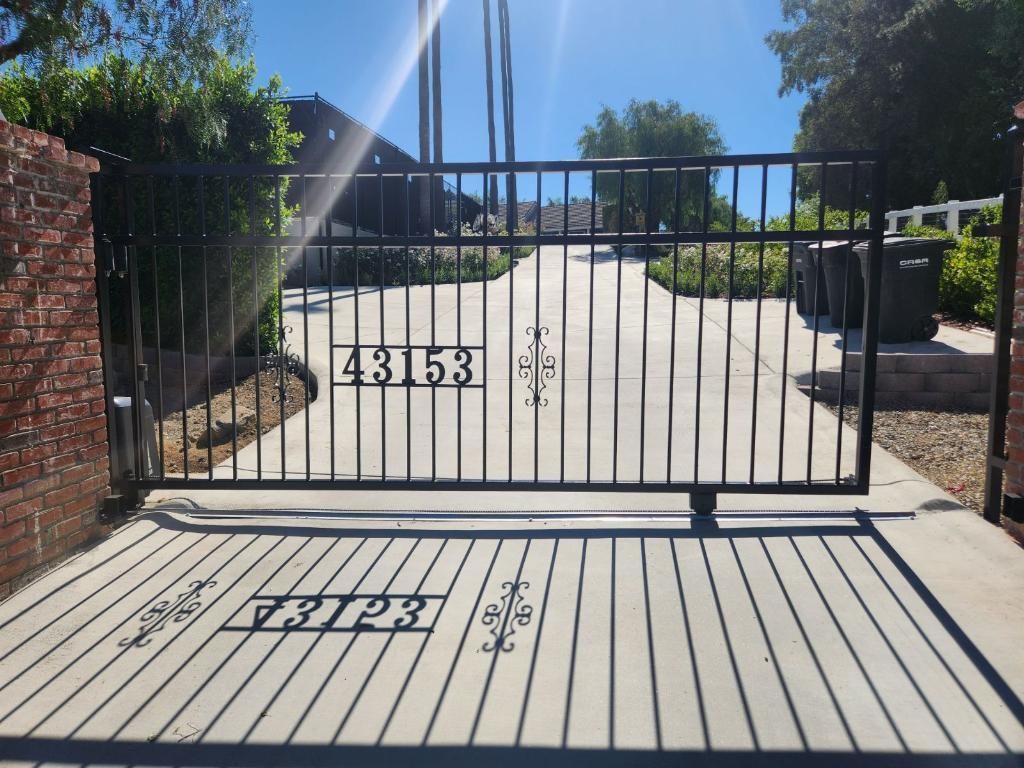 A gate with the number 43153 on it