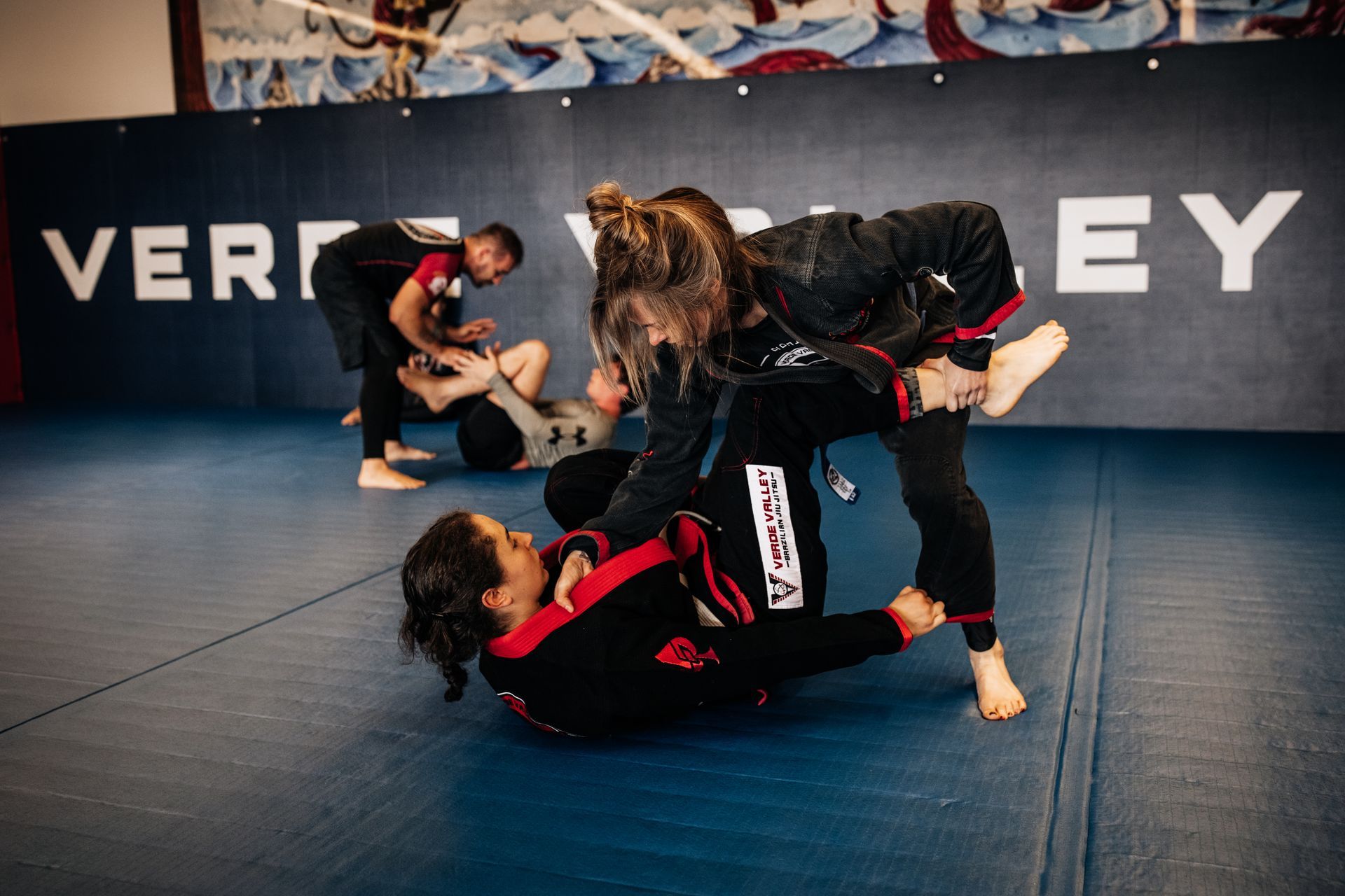 Women training Brazilian Jiu Jitsu at Verde Valley Brazilian Jiu Jitsu and Muay Thai in Cottonwood.