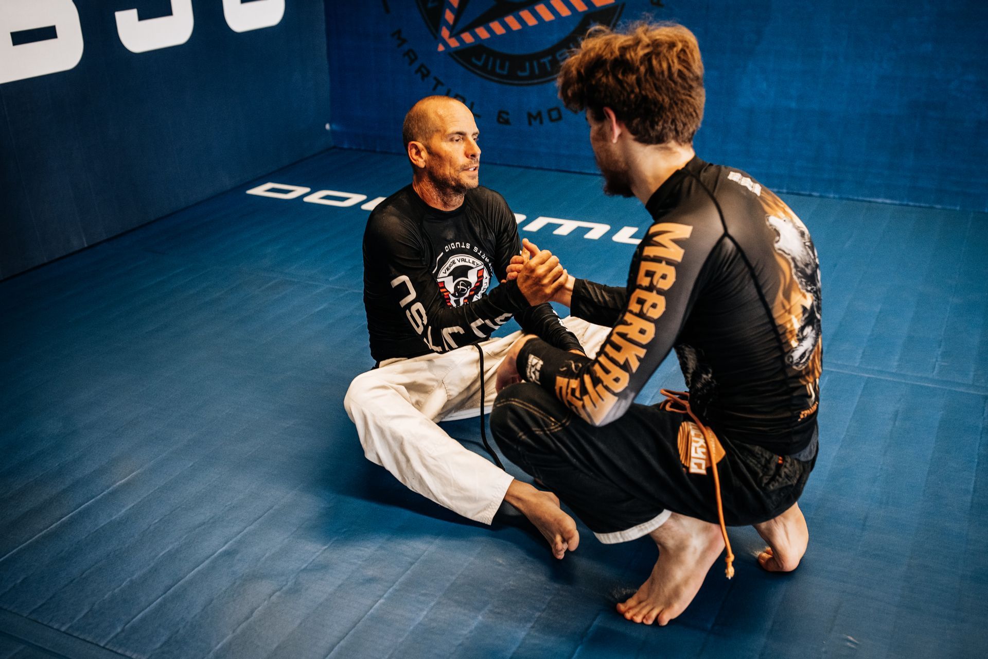 Adults practicing Brazilian Jiu Jitsu drills at Verde Valley Brazilian Jiu Jitsu and Muay Thai.