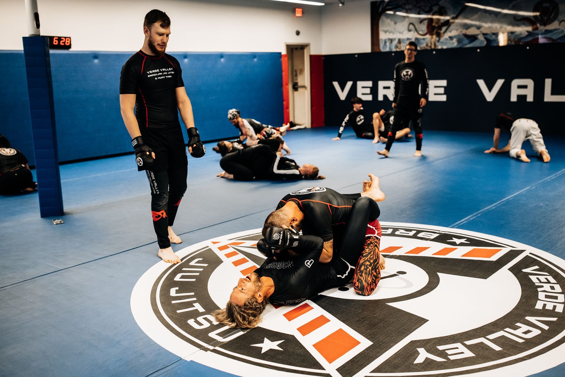 Adults drilling Brazilian Jiu Jitsu techniques at Verde Valley Brazilian Jiu Jitsu and Muay Thai.
