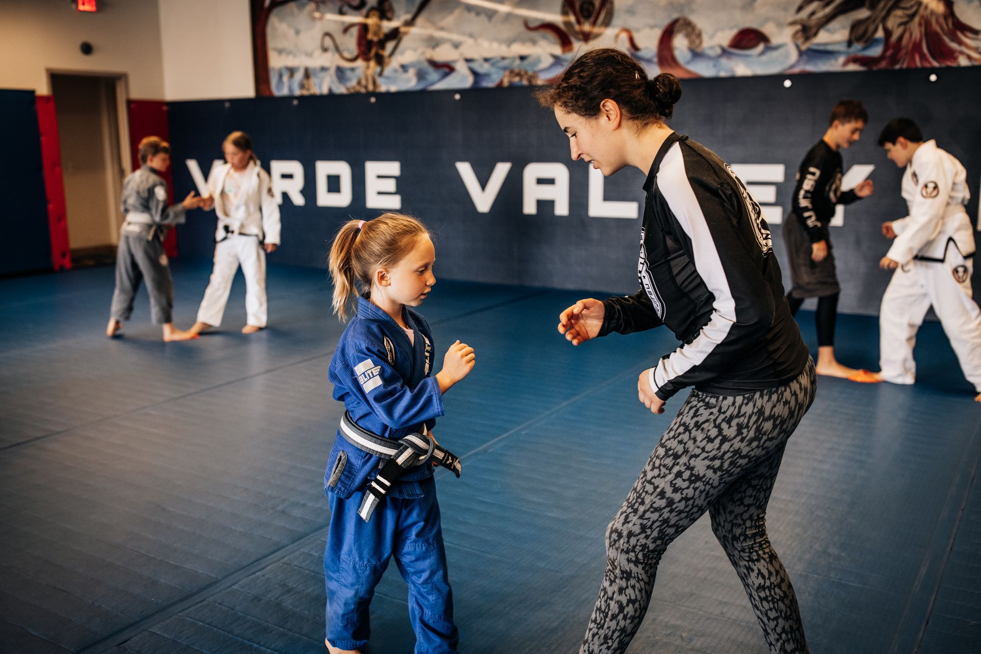 Students drilling Brazilian Jiu Jitsu techniques at Verde Valley Brazilian Jiu Jitsu and Muay Thai in Cottonwood, AZ for faster progress
