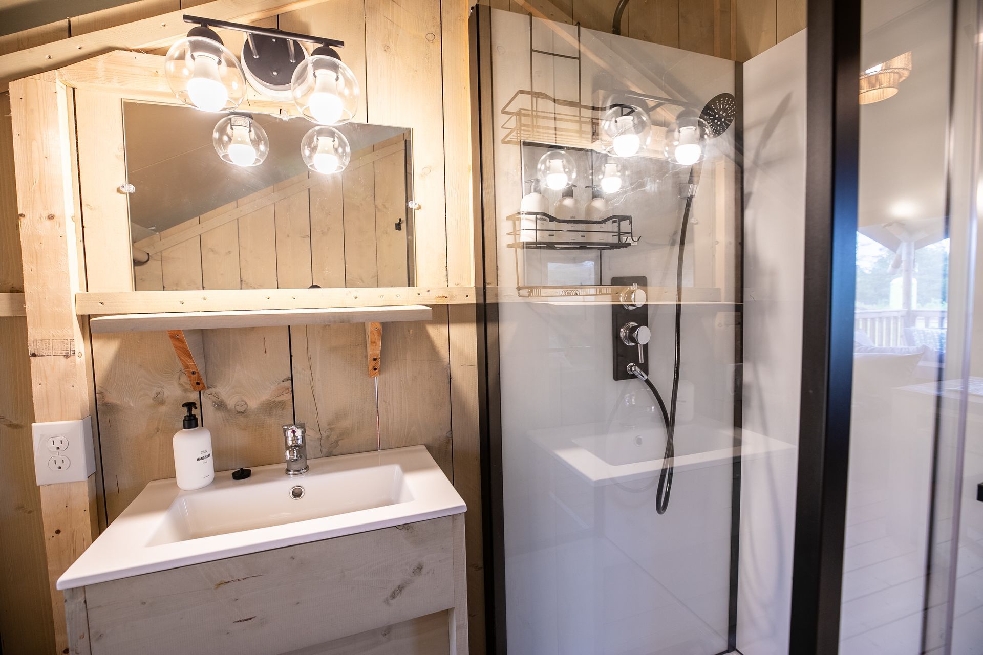 Interior bathroom photo inside a canvas cabin glamping unit  at Clay Cosmos in Lumpkin Georgia.