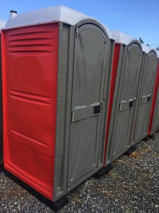 Red Portable Toilet — Portable Toilets in Elizabethtown, PA