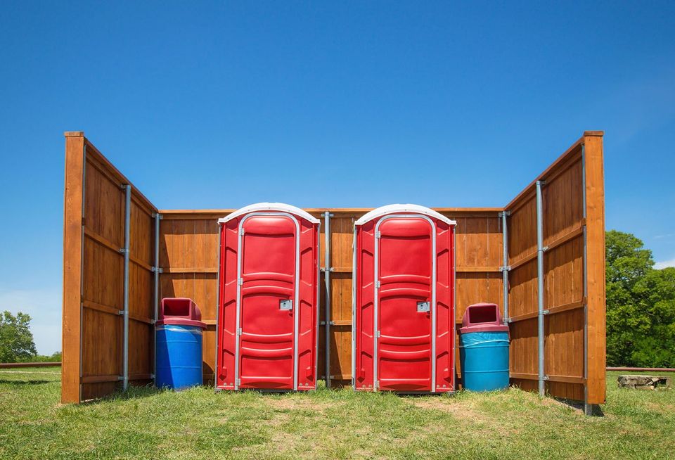 Dumpster Rentals — Two Red Portable Restrooms in York, PA