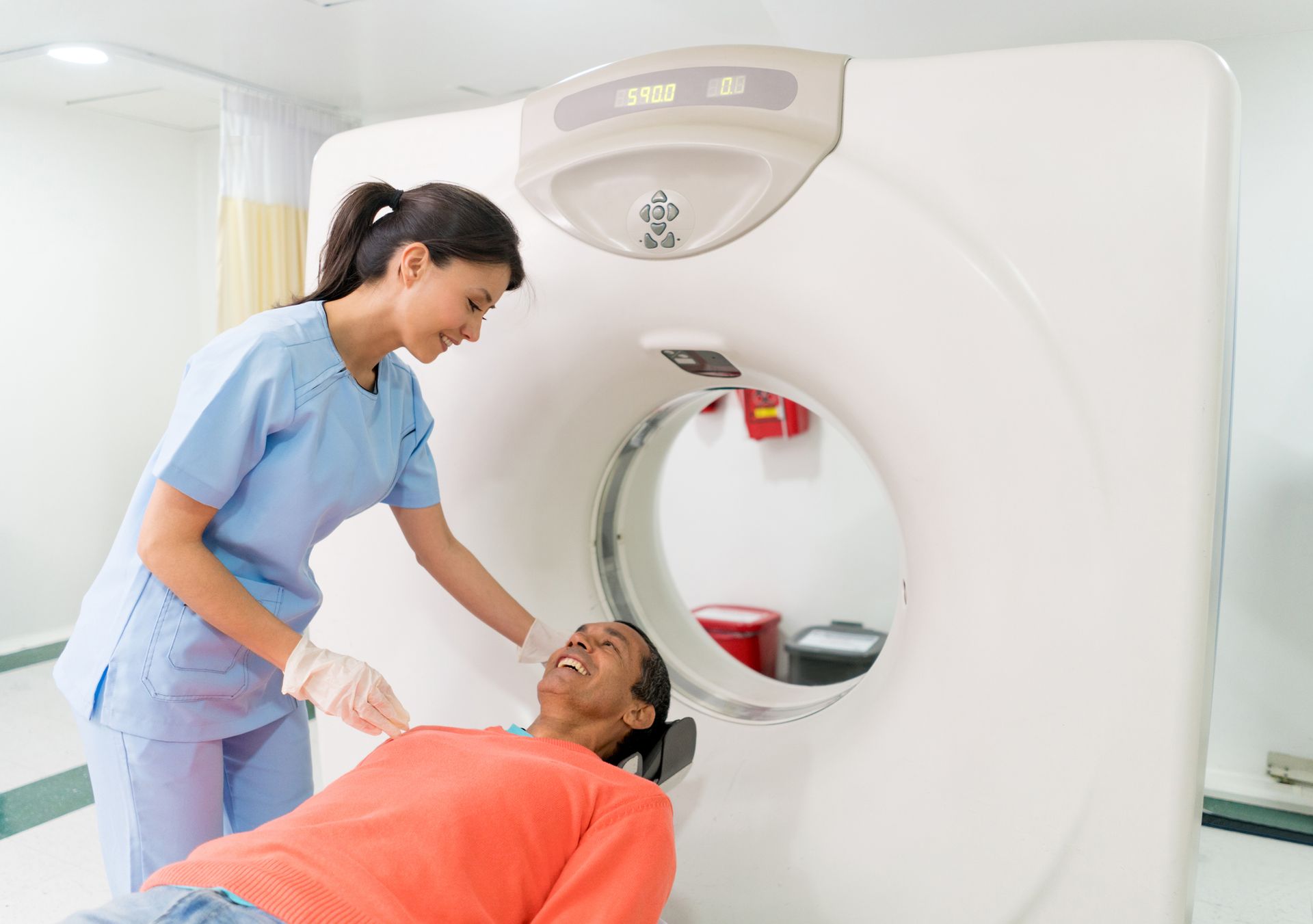 Patient getting a CAT scan at the hospital